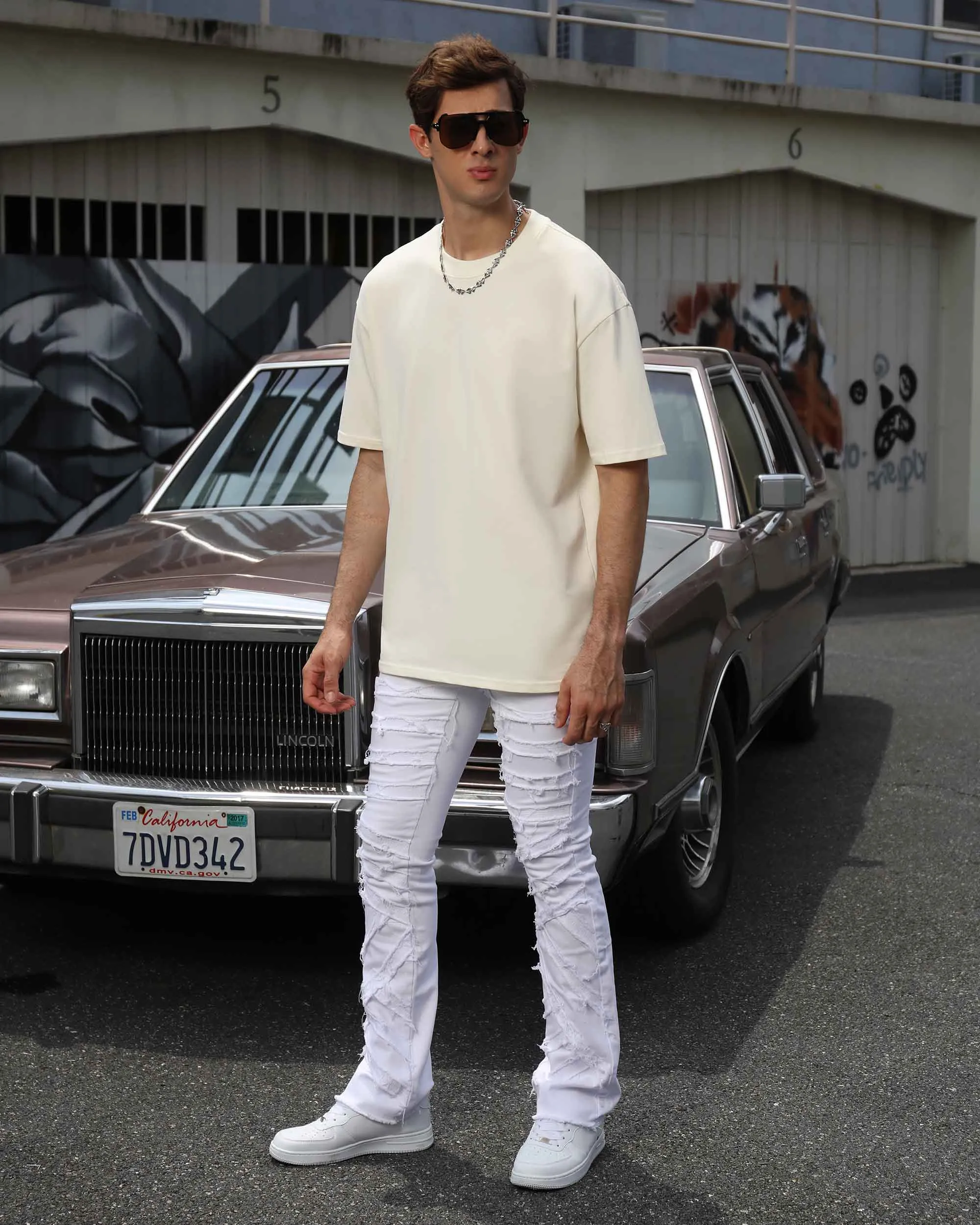 Retro Edge White Flared Jeans with Raw Edge